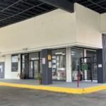 Covered Entrance into the storage facility with sliding doors